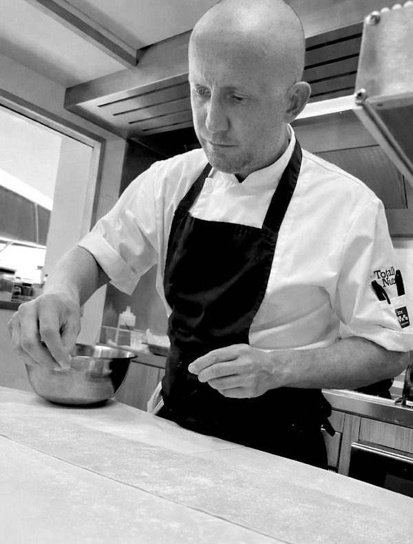 Charlie making pasta